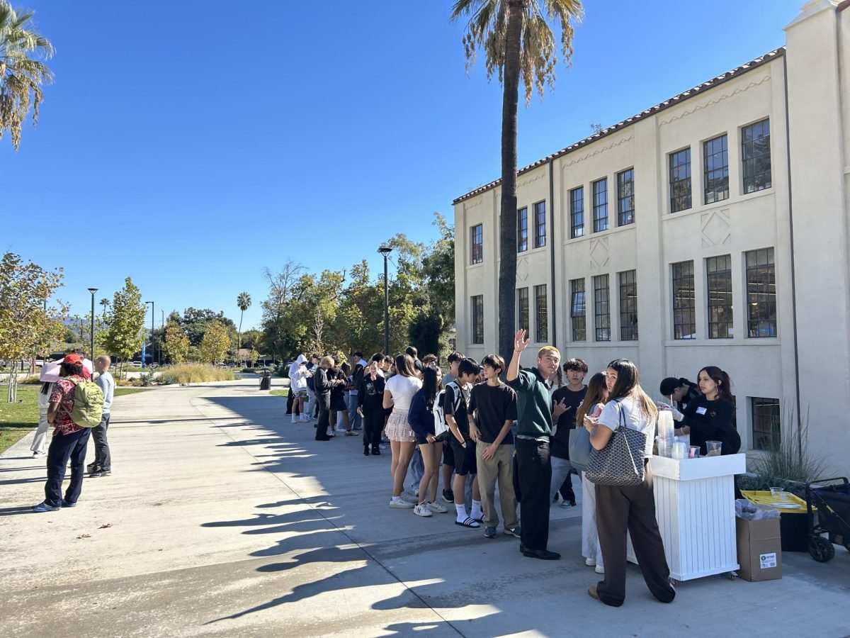 Students wait in a long line for their Acai bowl. But how can I get an Acai bowl? Once students finished engaging with 20 booths, they redeemed their tickets for a free Acai Bowl! According to students, this is was one of the best parts of the Wellness Fair.