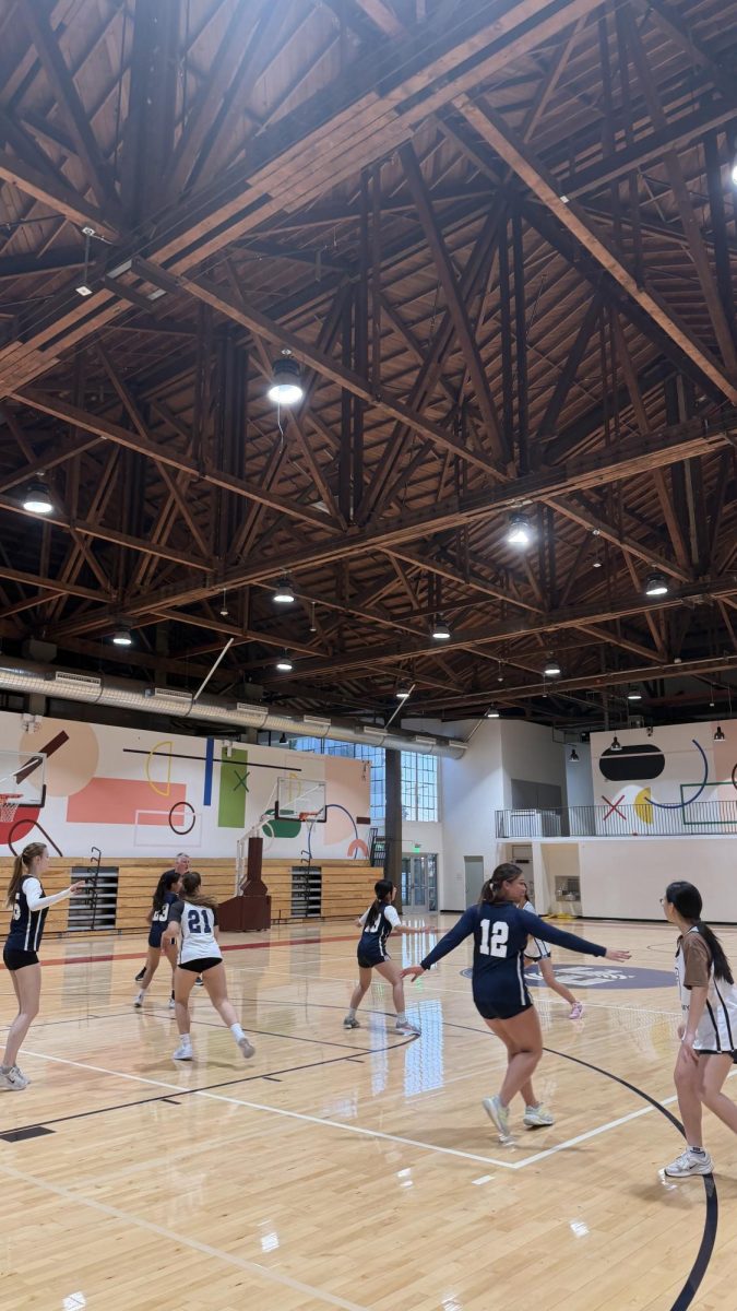 Basketball practice in Robinson Gym.
