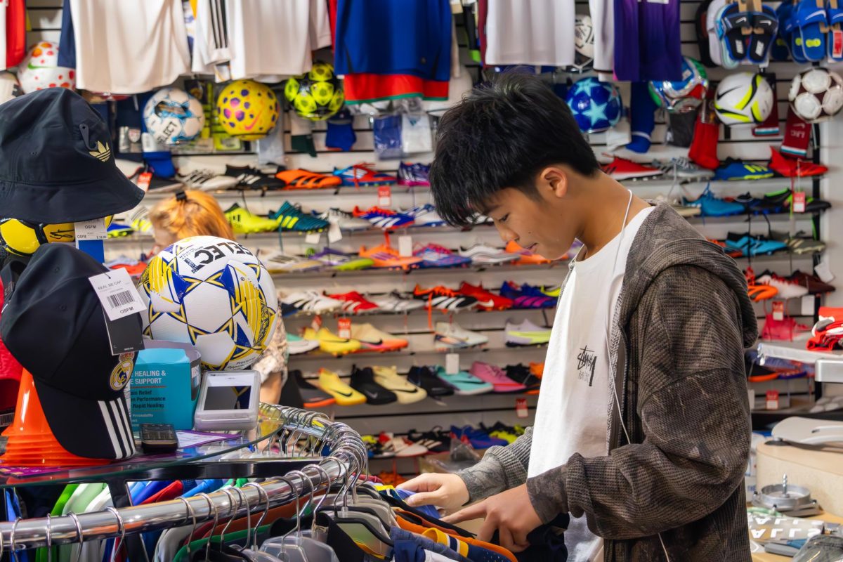 EF Student, Brian Yu, browsing in SoccerPlus.