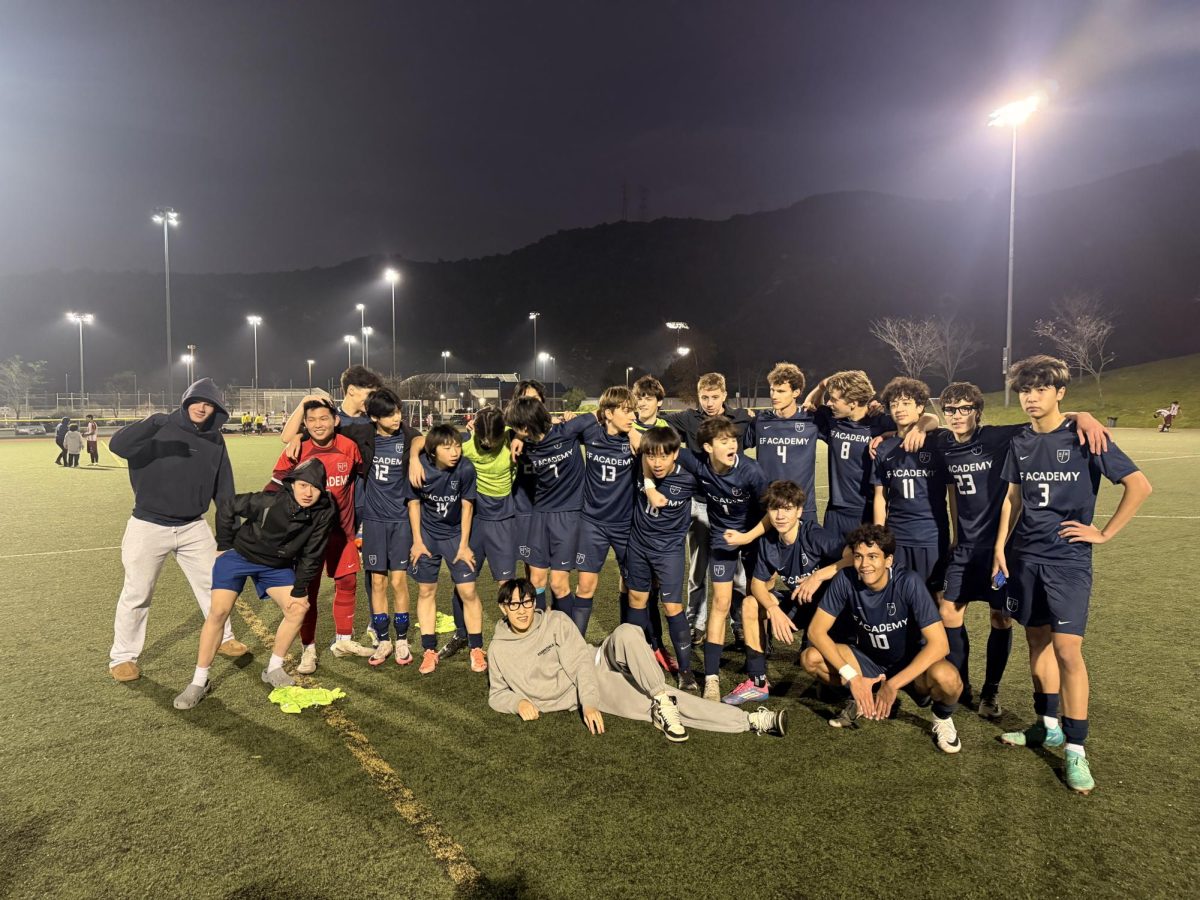 The team poses after their successful match.