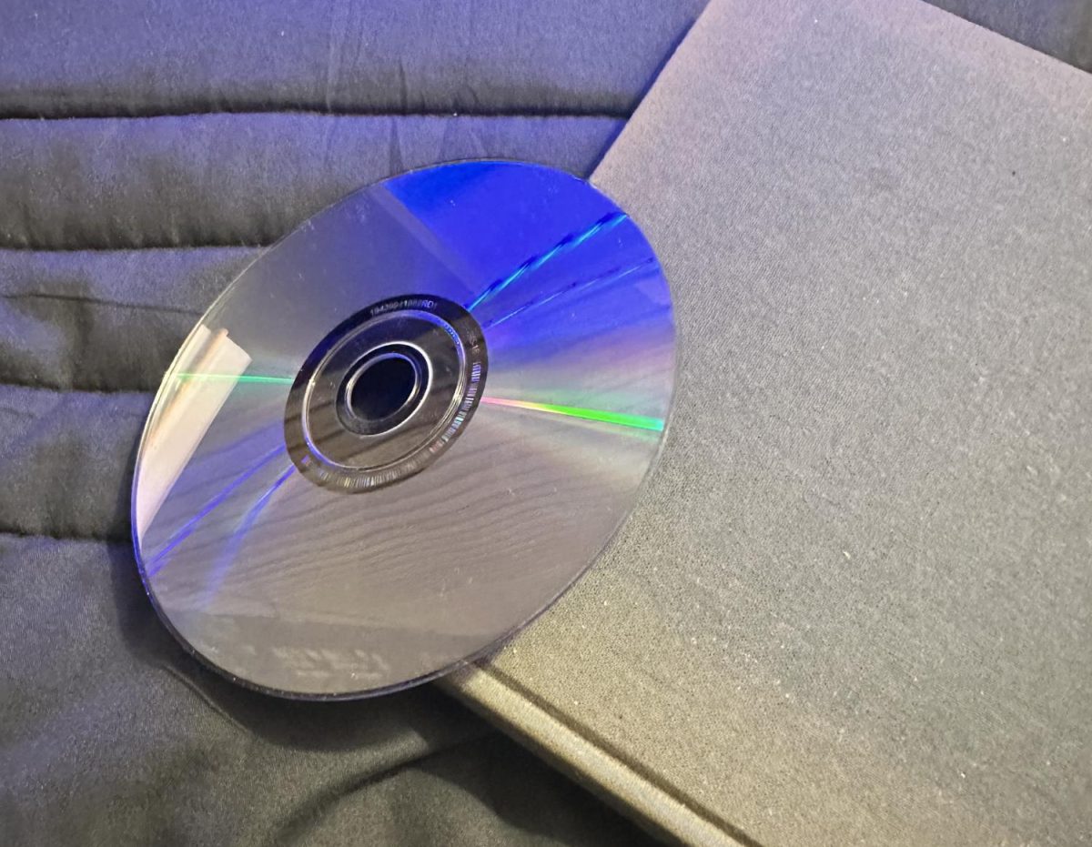 A CD placed on a book.
