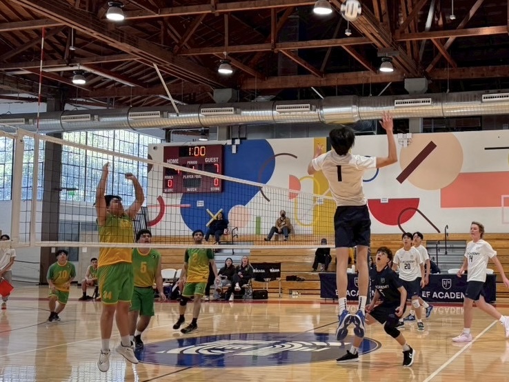 Aron Hyun jumping to spike the ball 