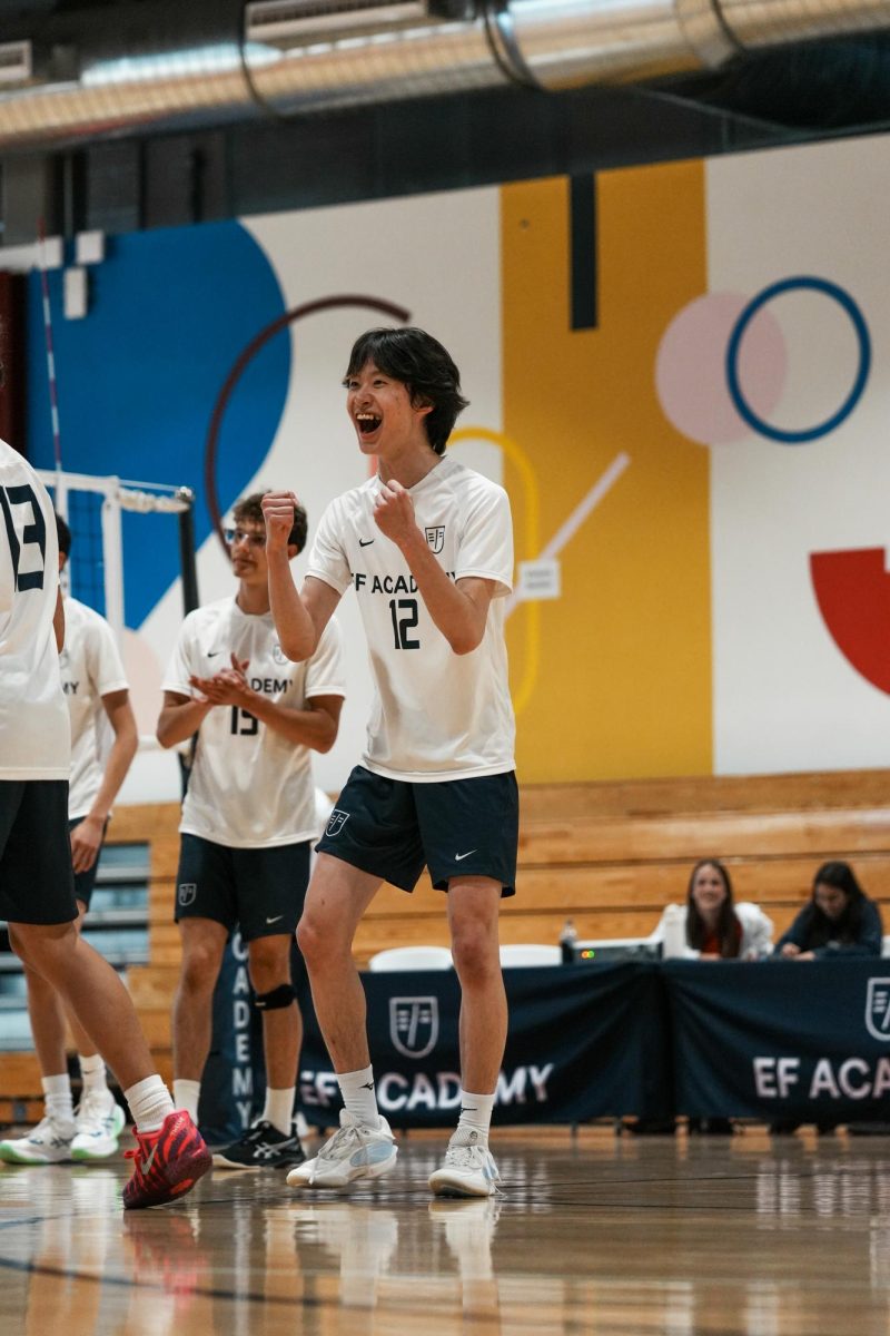 Player Yeseong Kim celebrate the success of Matthew Masuta's serves